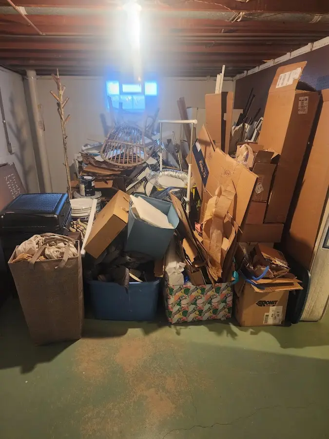 Roll-off dumpster container at job site for 2 Yard Dumpster Rental in Belle Chasse